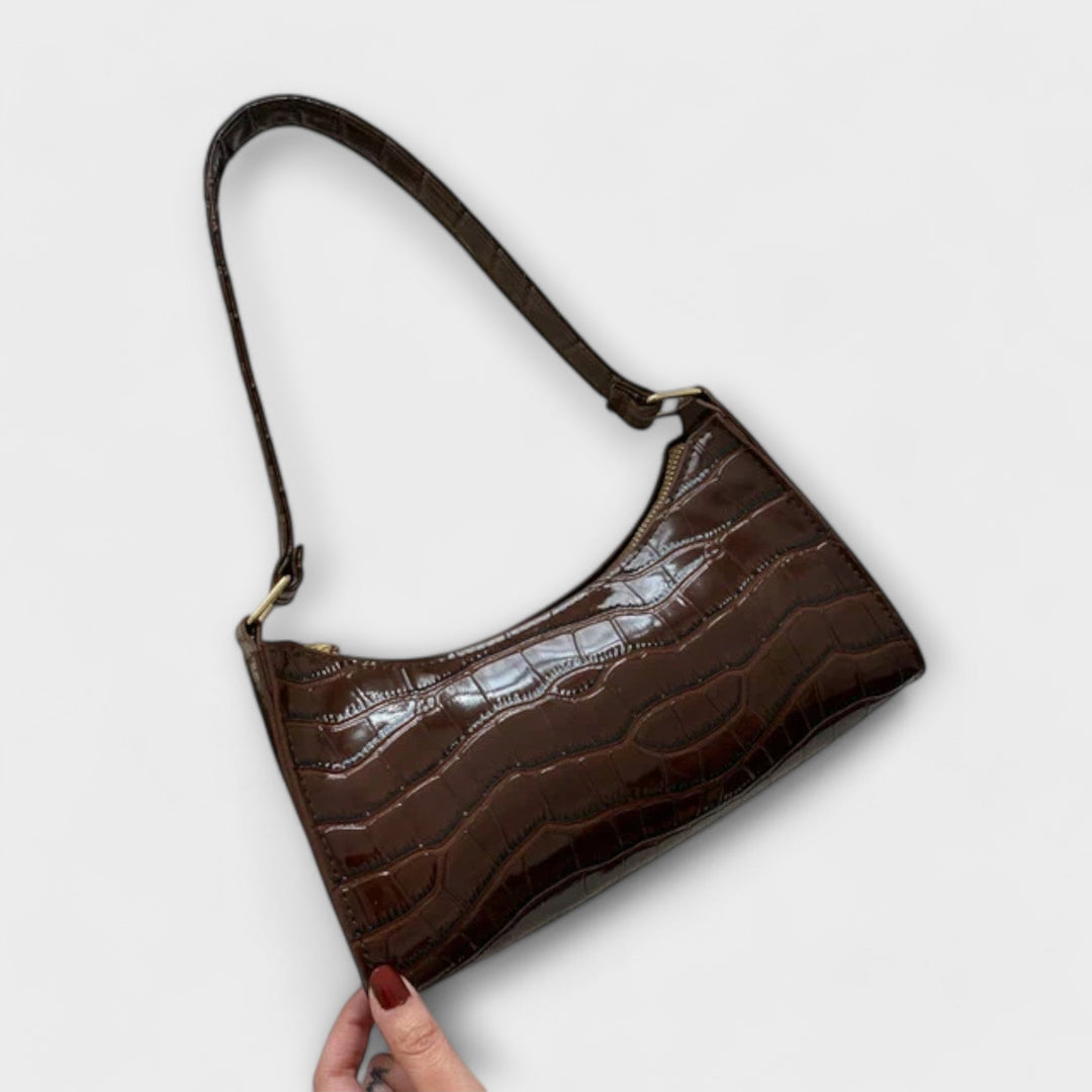 Flair. Glänzende Ledertasche