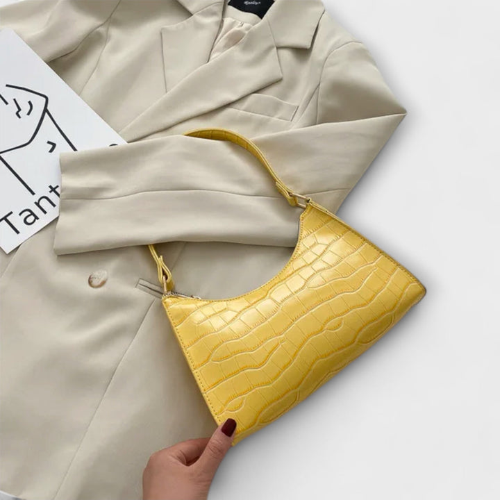 Flair. Glänzende Ledertasche