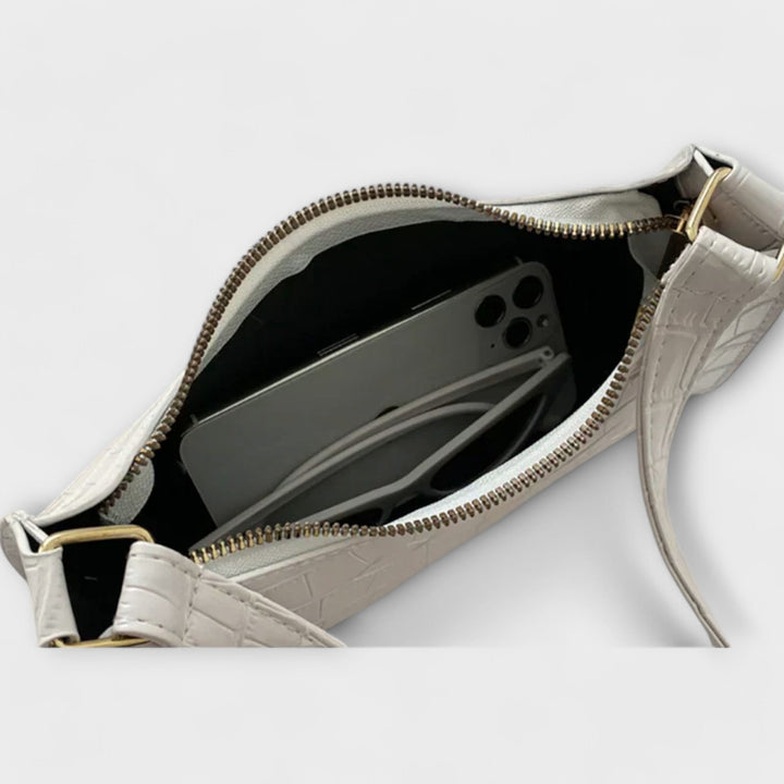 Flair. Glänzende Ledertasche