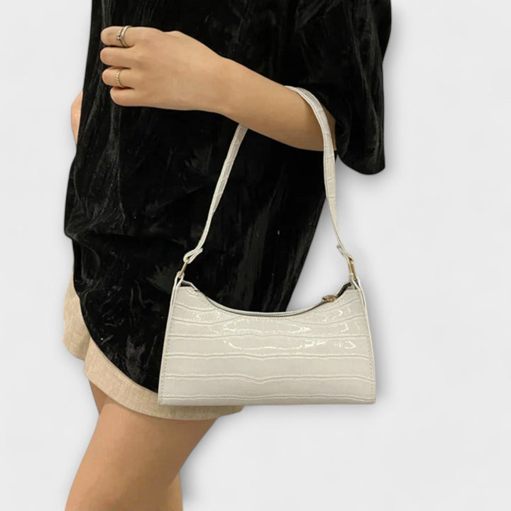 Flair. Glänzende Ledertasche
