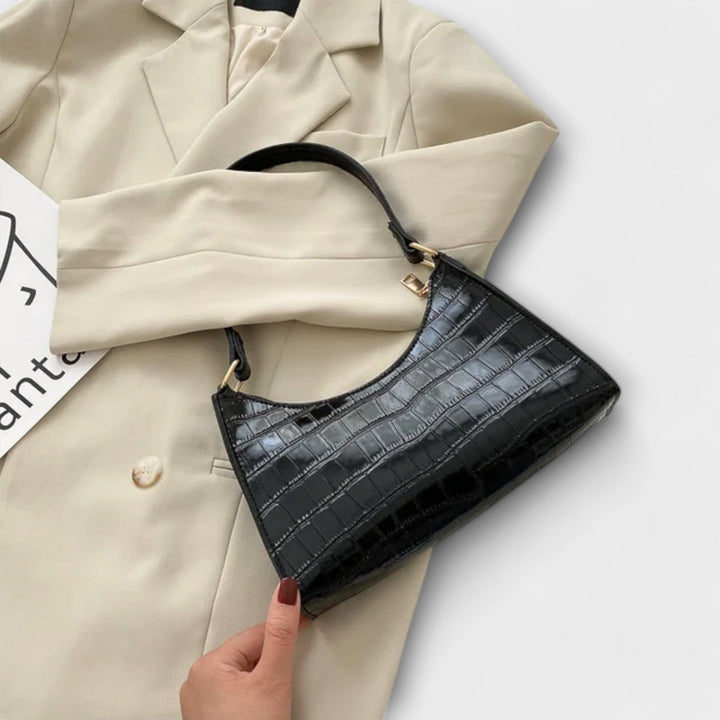 Flair. Glänzende Ledertasche