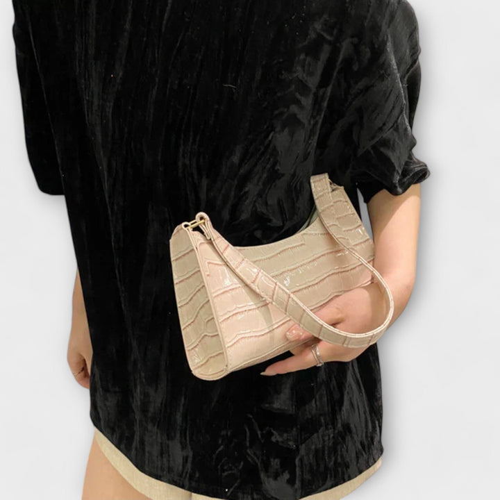 Flair. Glänzende Ledertasche